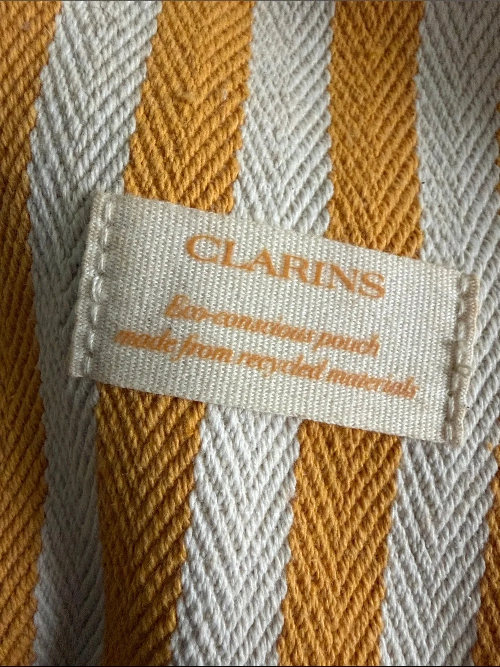 Clarins Golden Yellow and White Striped Travel Cosmetic Pouch